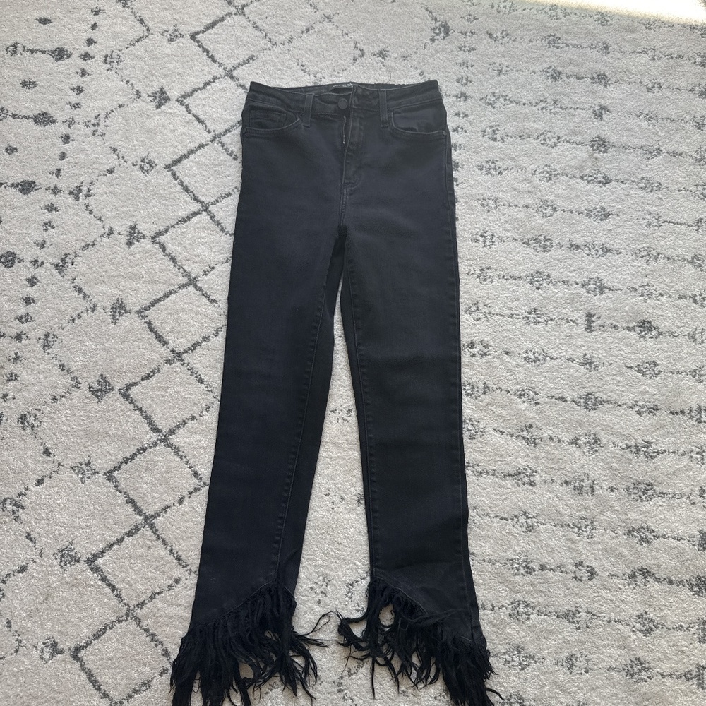 Just black denim jeans with ruffle on bottom